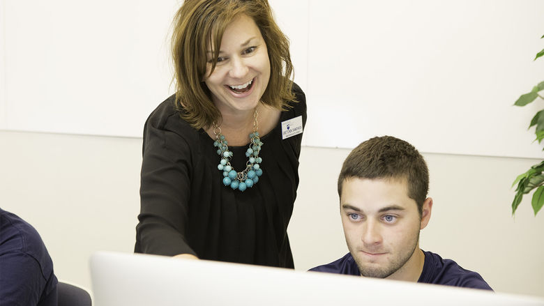 Gretchen Samchuck works with a student