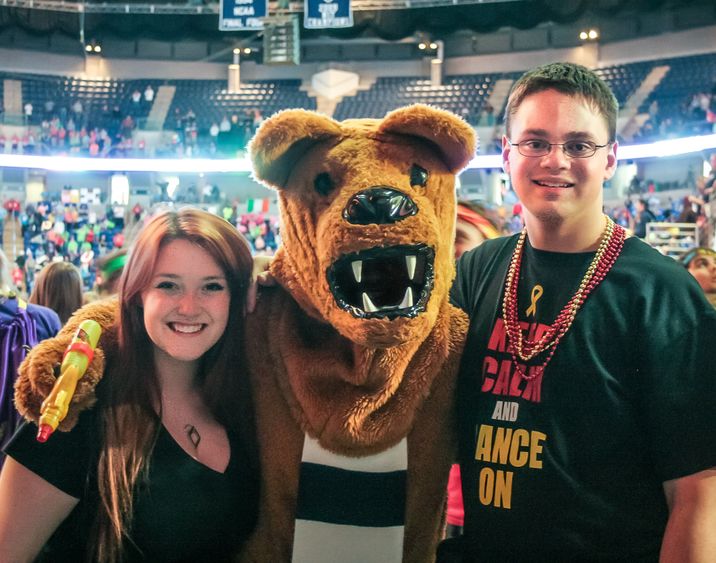 Beaver students pose with the Nittany Lion at Thon.