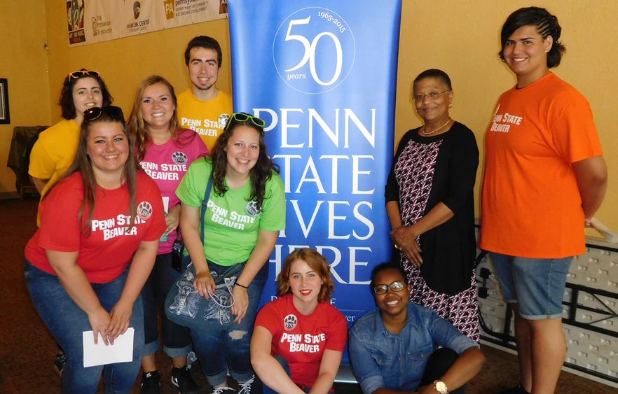 Penn State Beaver students take a break from volunteering to pose with the Franklin Center's Valerie McElvy.
