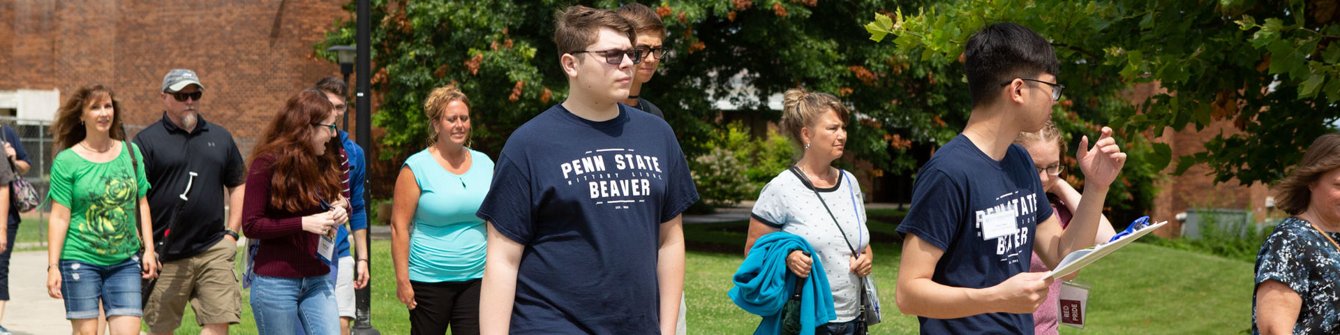 Prospective students and their parents tour campus.