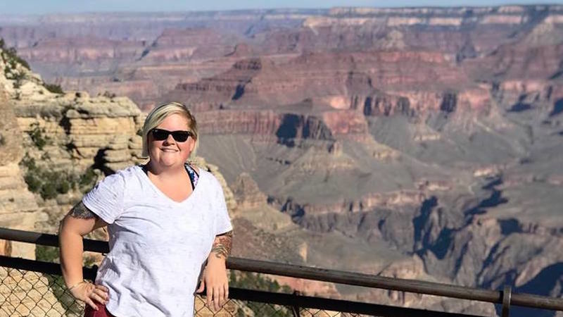 Amy Green poses in front of the Grand Canyon