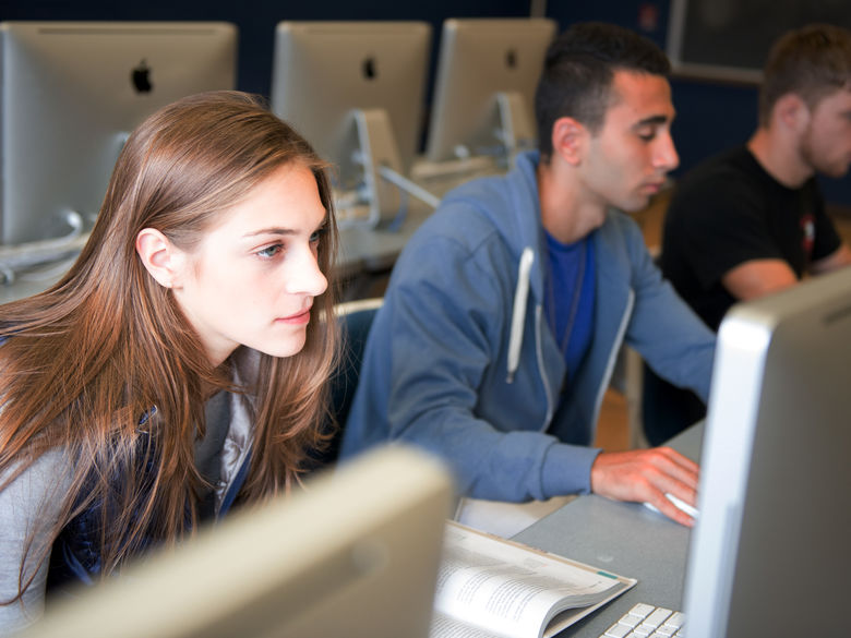 Students work in a computer lab