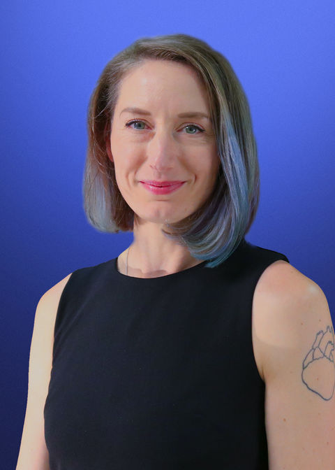 A photo of Kate McLean on a blue background