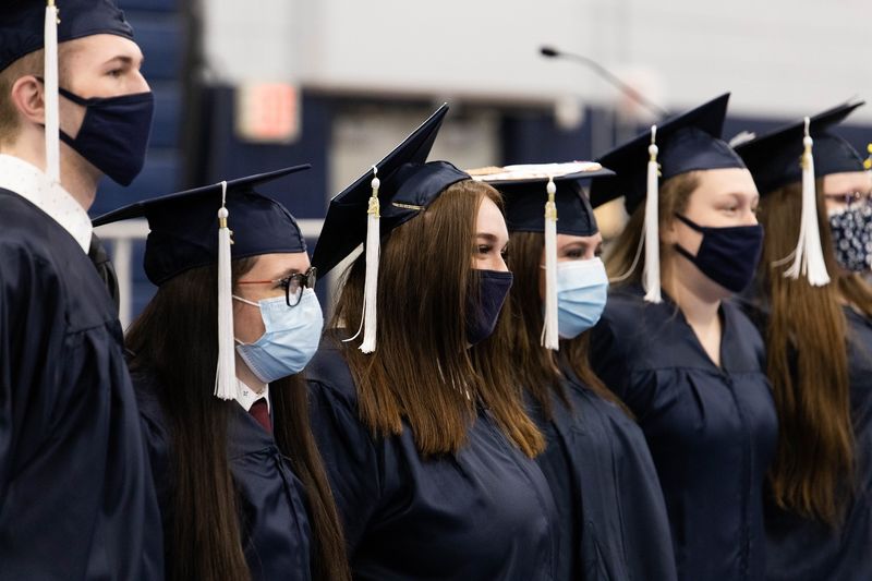 Graduates pose for photo