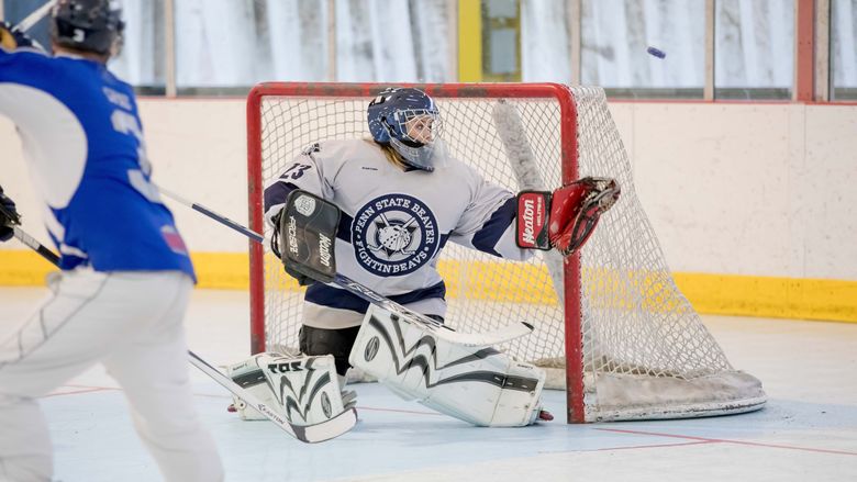 Goalie Katie work watches as the puck careens off her glove.