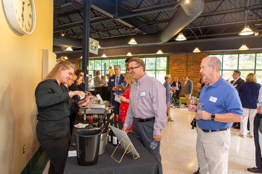 Guests are served wine in the Penn State Beaver Brodhead Bistro