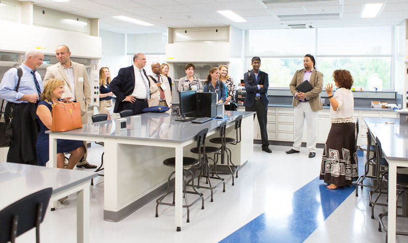 Beaver Chemistry Instructor Claudia Tanaskovic talks to a tour group in the chemistry lab.