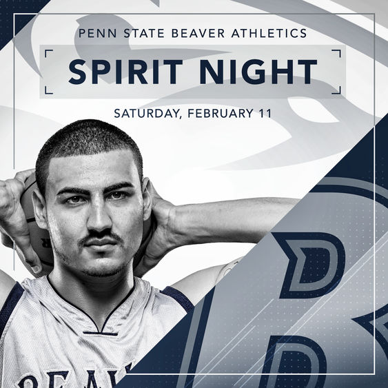 Penn State Beaver basketball player stands in front of Spirit Night advertisement.