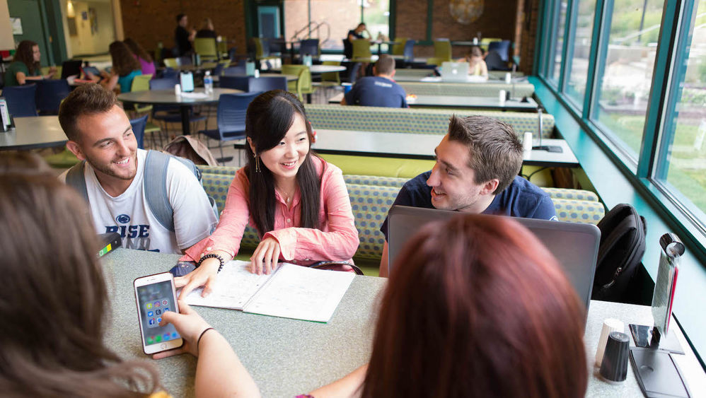 Eva Zhou sits with classmates in the Bistro.