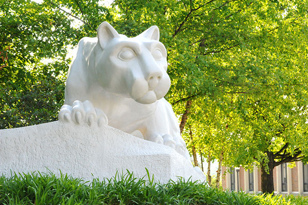 The Lion Shrine sits on the campus among trees
